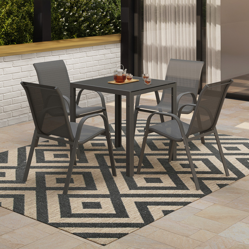 Ensemble repas Minorca 4 places en textilène et verre trempé gris anthracite Ensemble repas Minorca 4 places en textilène et verre trempé gris anthracite